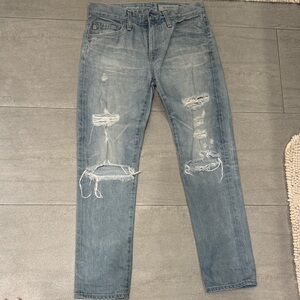 AG women’s ex boyfriend slim jeans Light Blue Distressed size 24